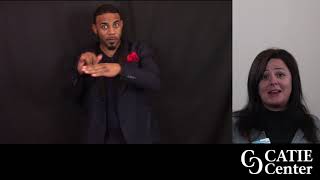 Split screen with left screena Black man wearing a black sport coat with a red handkerchief tucked in chest pocket; Right screen has native Woman with black hair wearing black shirt and grey sweater; Catie center logo in lower right.