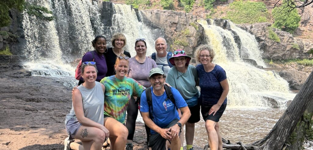 Dive In team in front of Gooseberry Falls